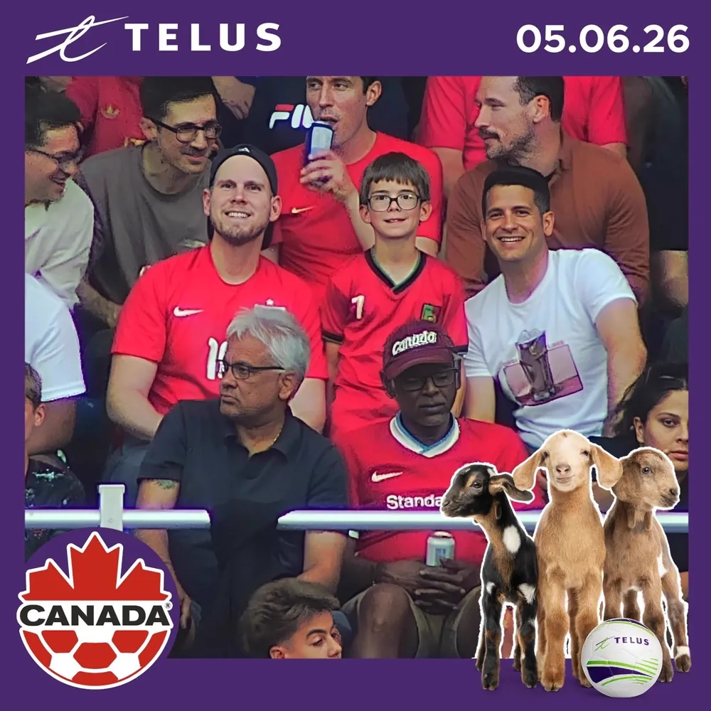 TELUS Fan Cam photo of Canada Soccer fans smiling in the stands at Stade Saputo
