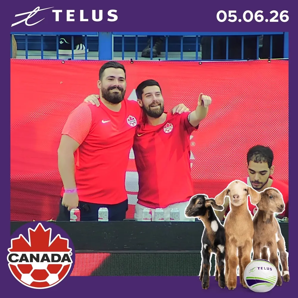 TELUS Fan Cam photo of two Canada Soccer fans posing together at Stade Saputo