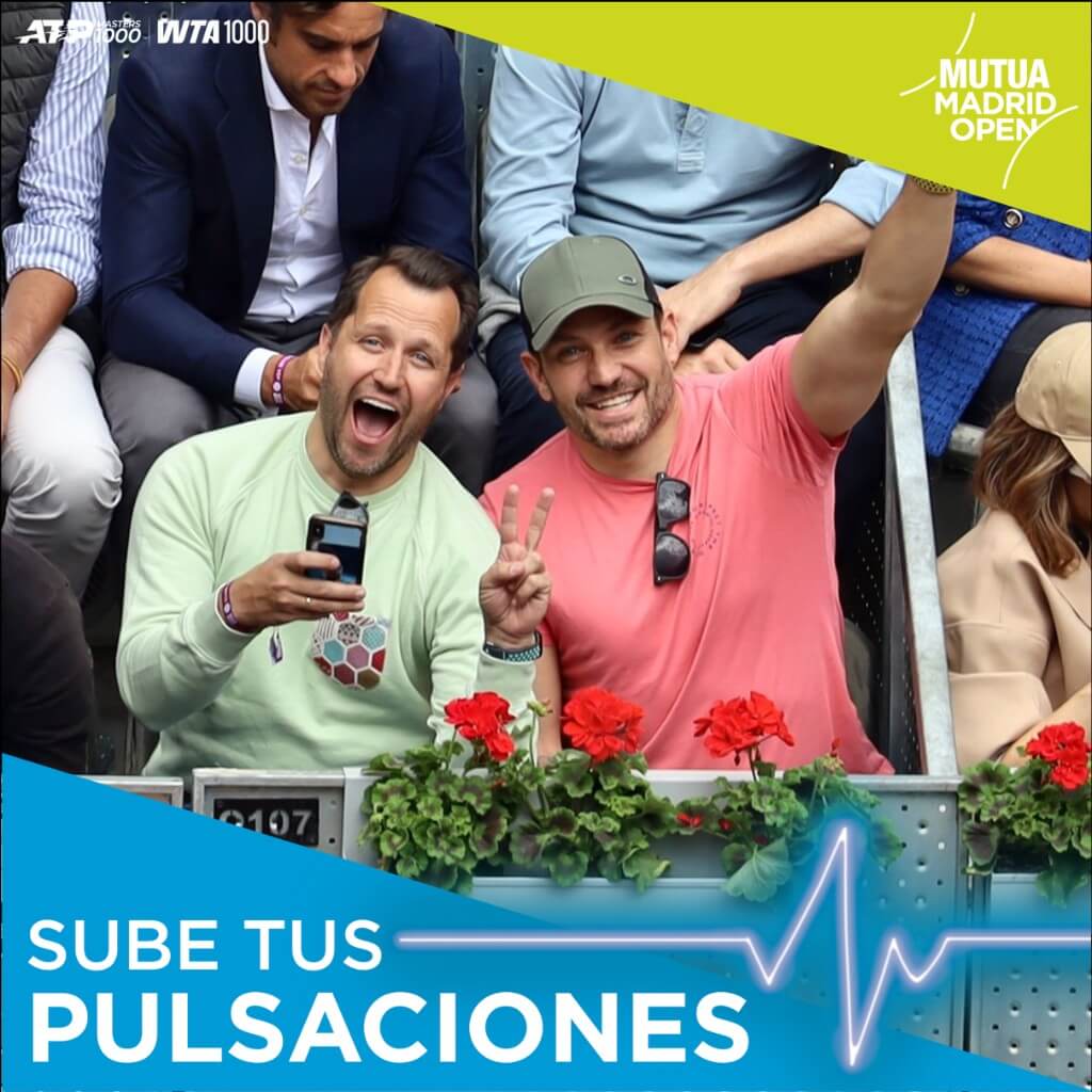 Fans at Mutua Madrid Open capturing unforgettable moments with smartphone and gestures — immersive fan engagement in action