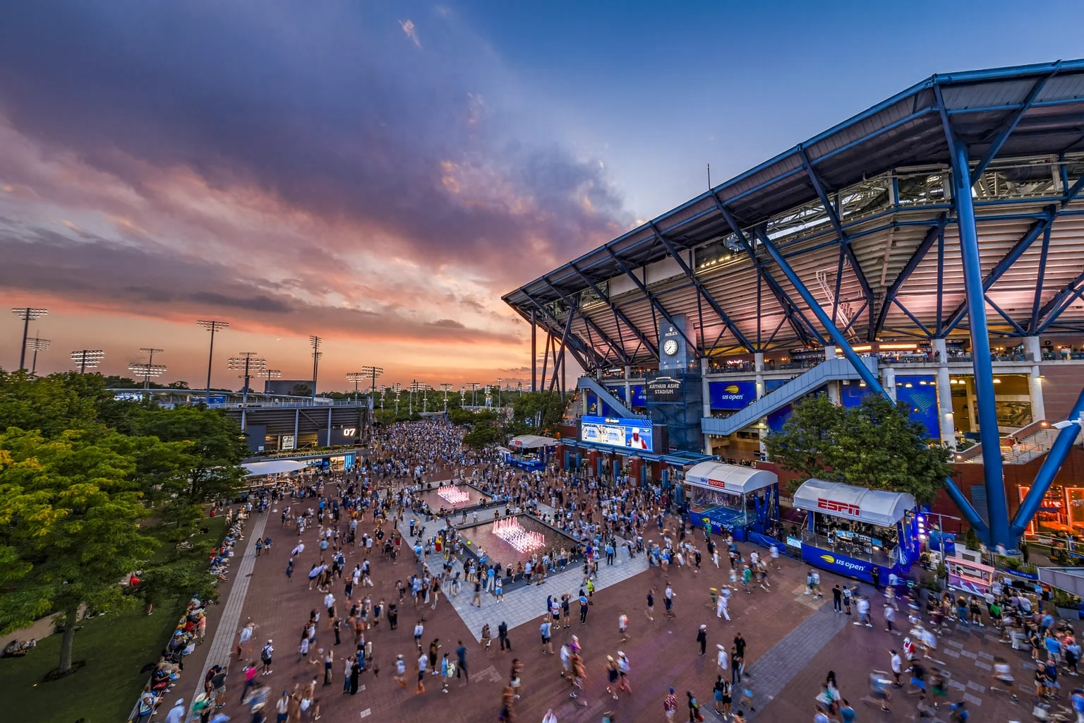 AMPLIFi Fan Zone hero: fans at an outdoor event using interactive camera technology